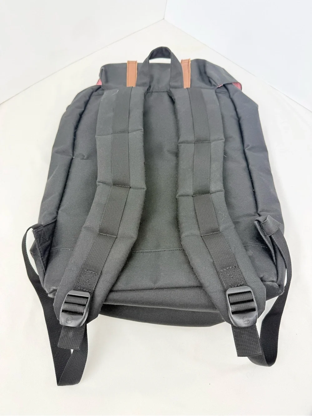 Hershel Retreat Backpack in Black Brown Saddle Canvas with Interior Red Stripe